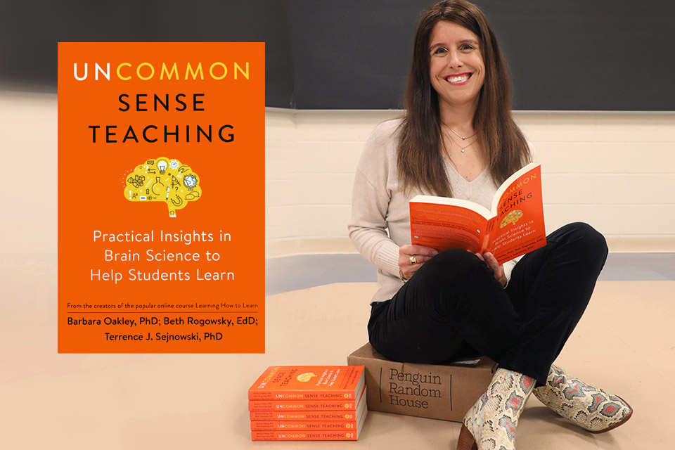 Beth in the classroom with the Book