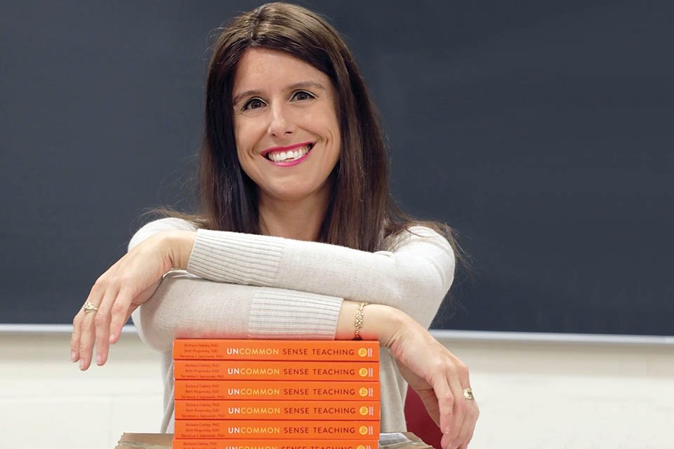 Beth with the books professional photos