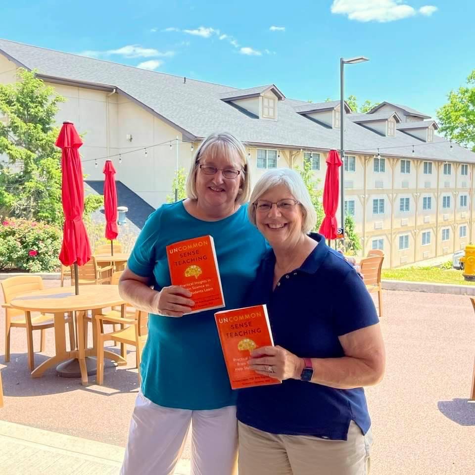 Teachers with the book