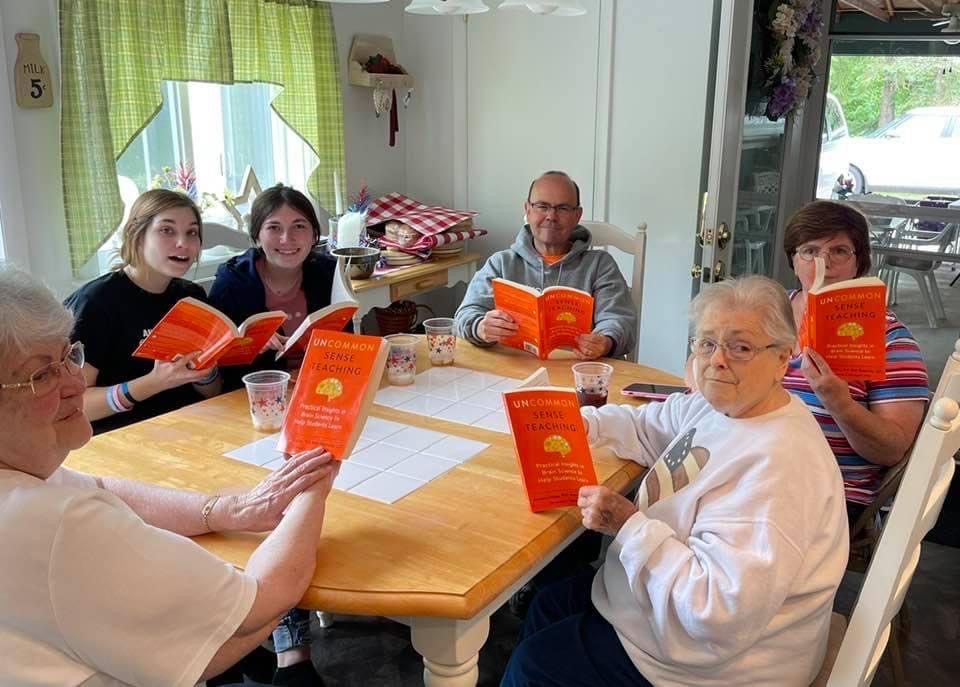 Beth's family with the book